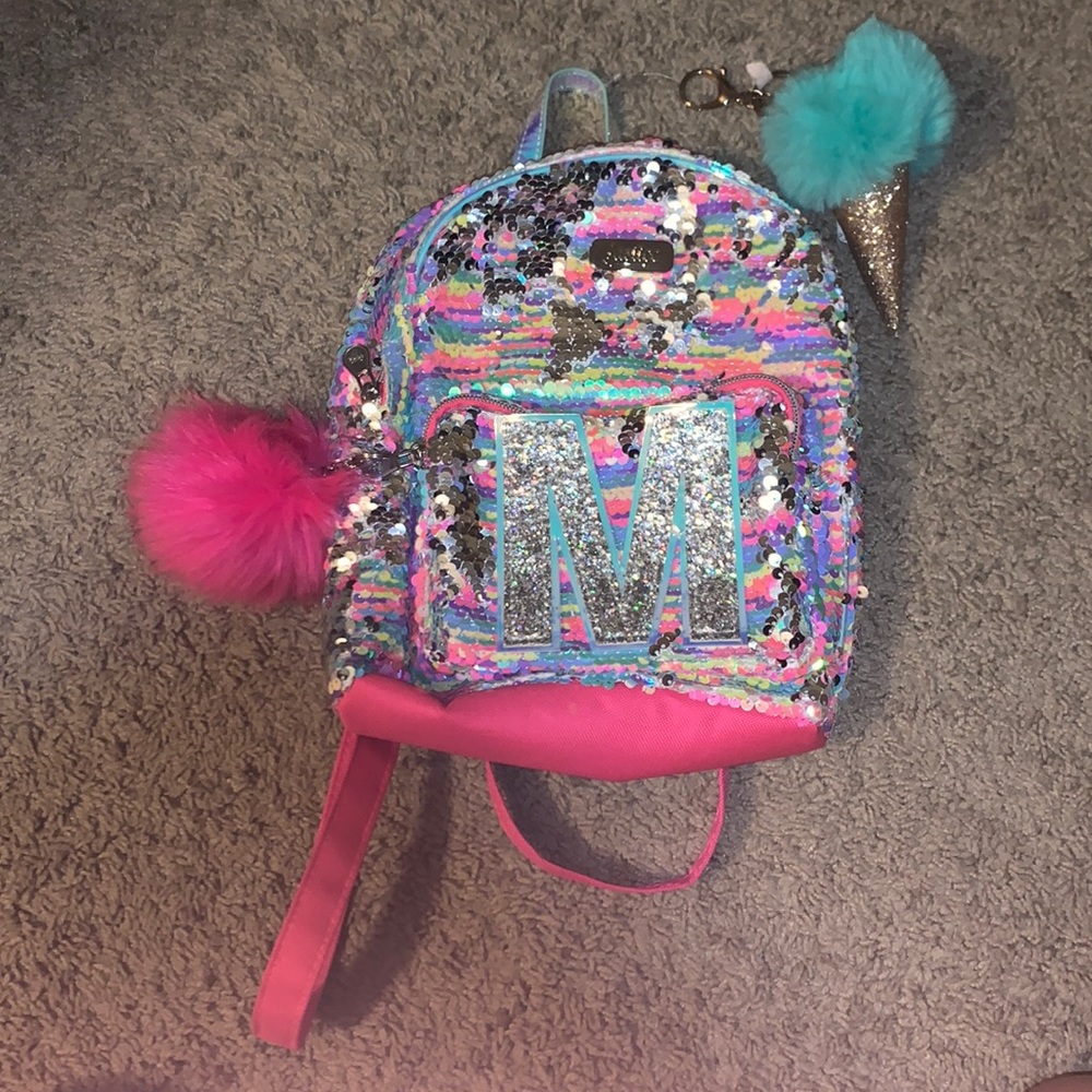 Initial backpack